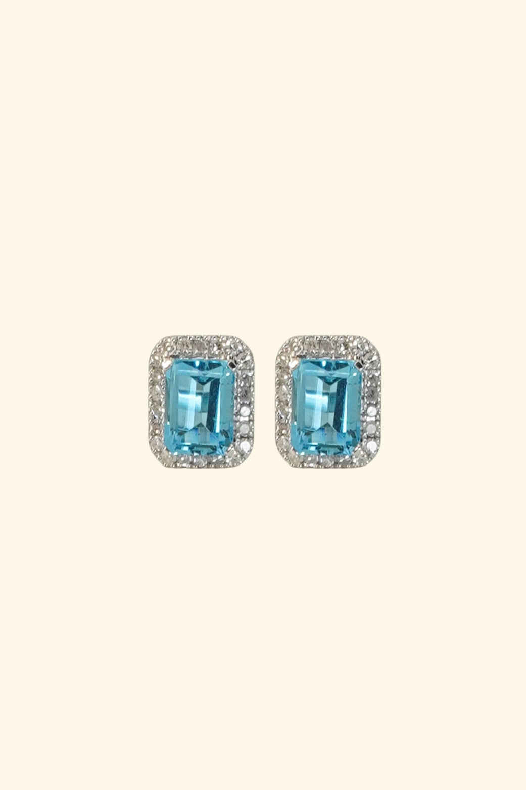 Emerlad Cut blue Topaz Stud Earrings