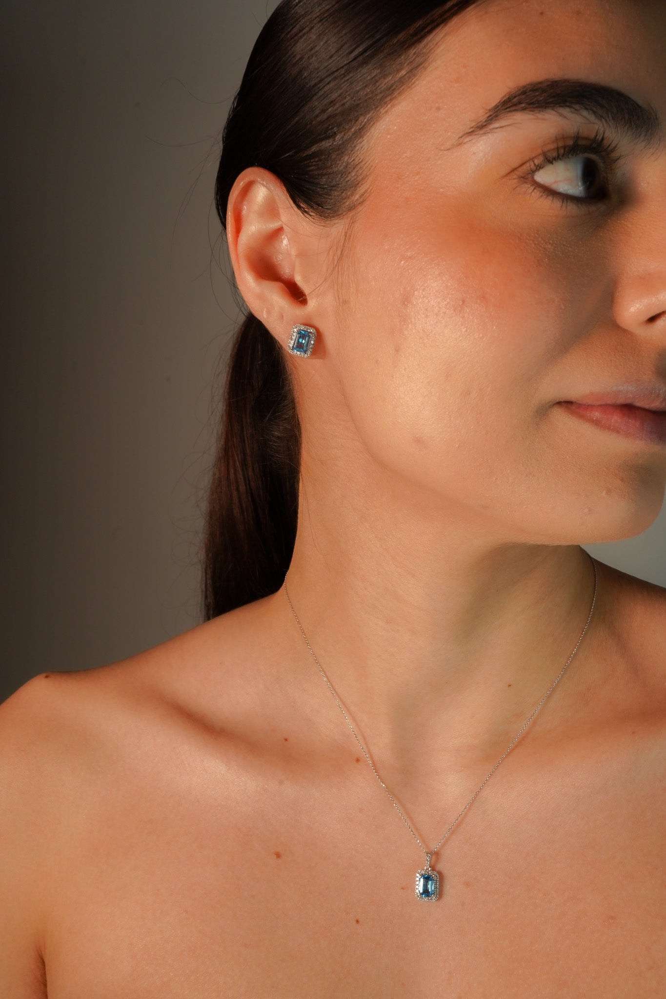 Emerlad Cut blue Topaz Stud Earrings